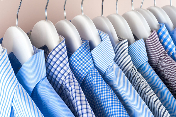 Business shirt ironing service in Davenham, Northwich — freshly pressed shirts on hangers
