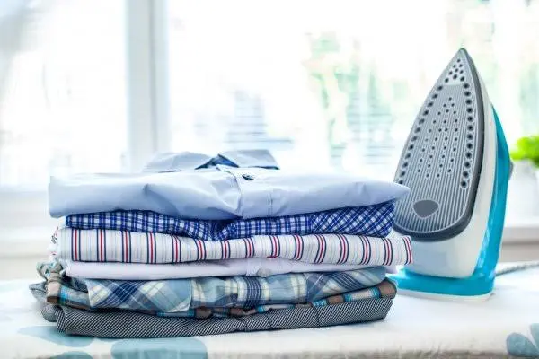 Neatly folded and pressed laundry prepared by Northwich Ironing Services